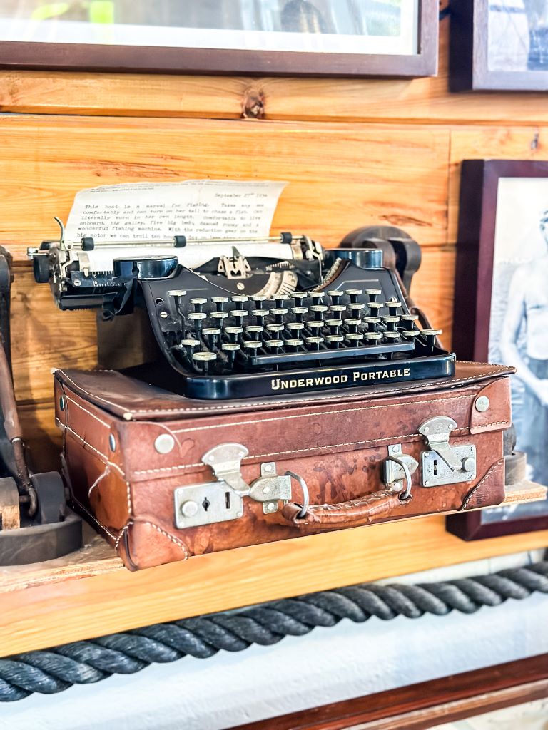A picture of one of Hemingway's original typewriters and case.