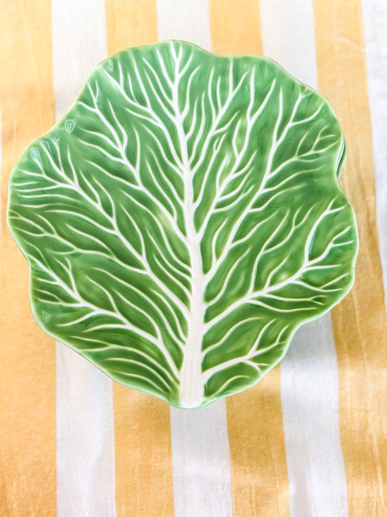 Green cabbage leaf salad plate. 