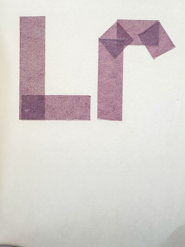 The letters L and O formed with purple masking tape on a white canvas for a Valentine’s Day tape-resist art project.