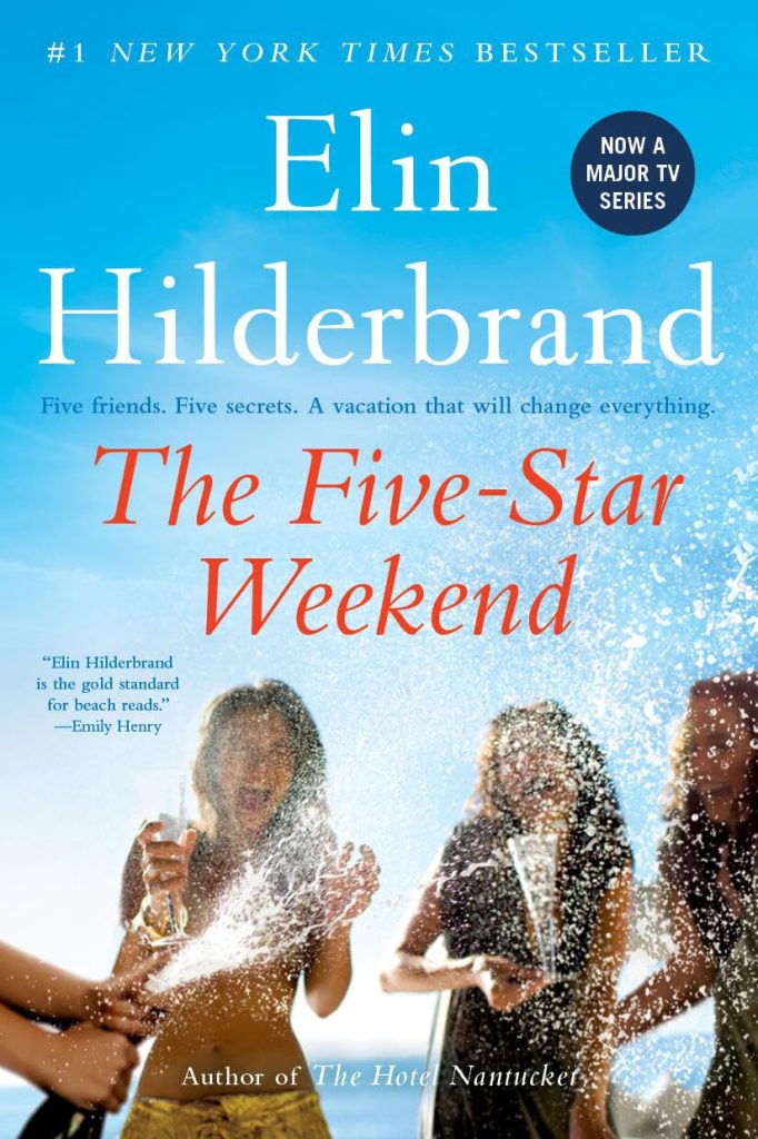 Book cover for "The Five-Star Weekend" by Elin Hilderbrand, featuring three women laughing and popping champagne with ocean water splashing around them. This vibrant cover makes a perfect visual addition to a list of summer book recommendations.