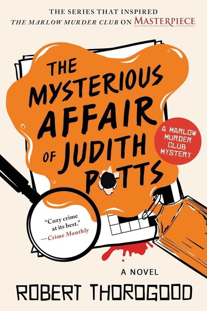 Book cover for "The Mysterious Affair of Judith Potts" by Robert Thorogood, a Marlow Murder Club mystery novel. The illustration features an orange ink spill over a crossword puzzle, a magnifying glass, and a small pool of red blood, making it a great addition to summer book recommendations.