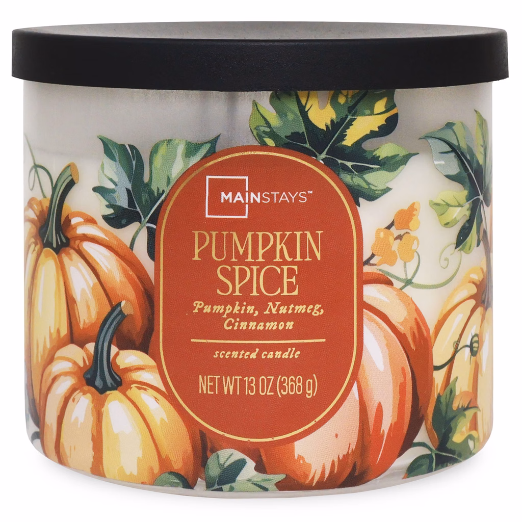 Mainstays pumpkin spice scented three wick glass jar candle with autumn pumpkin illustration.