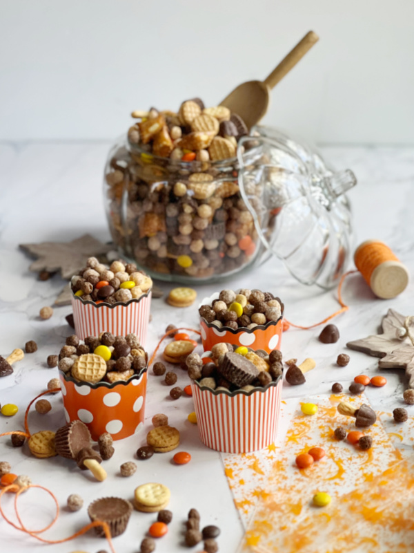 Sweet and savory no-bake peanut butter fall snack mix in a bowl for seasonal gatherings.